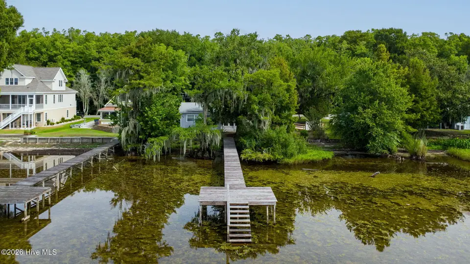 704 Canal Cove Road, Lake Waccamaw, NC 28450 – photo 1 of 71: Private Pier