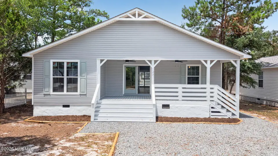 137 NE 31st Street, Oak Island, NC 28465 – photo 1 of 50