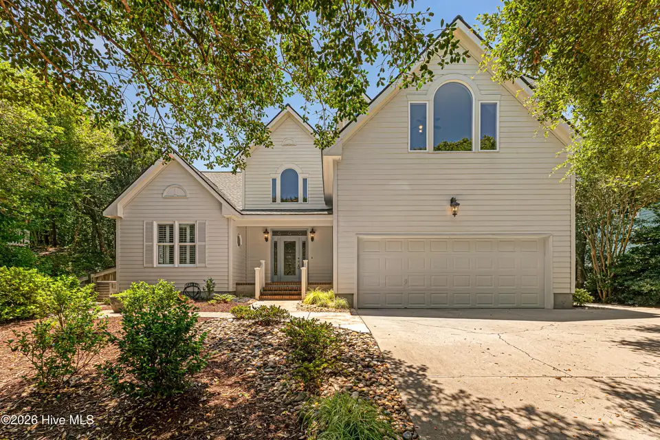 573 Coral Ridge Road, Pine Knoll Shores, NC 28512 – photo 1 of 59: Stunning Pine Knoll Shores home