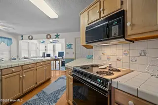 109 NE 1st Street, Oak Island, NC 28465 – photo 18: 36-web-or-mls-DSC03839