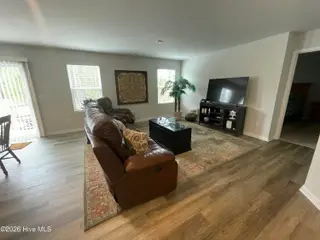 1439 New Sun Drive SE, Bolivia, NC 28422 — 4-bedroom home in Olde Georgetowne, Bolivia, NC, photo 10 of 15: 1439 living room 2