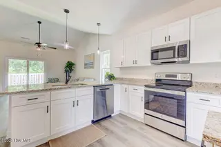 548 Timbercrest Circle SE, Bolivia, NC 28422 – photo 8: D927A606-6750-47D2-8D07-59D835CC754D_1_1