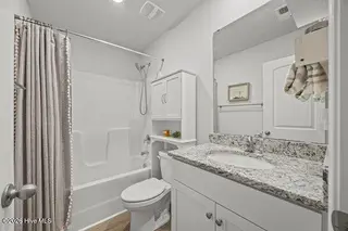 238 Poppleton Drive, Hampstead, NC 28443 – photo 9: m_9_bathroom