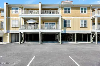 700 Ocean Drive Unit 104, Oak Island, NC 28465 – photo 1: 700OceanDriveUnit104-1