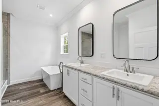 9163 Southern Boulevard SE, Winnabow, NC 28479 — 3-bedroom home, Winnabow, NC, photo 18 of 28: Master bathroom