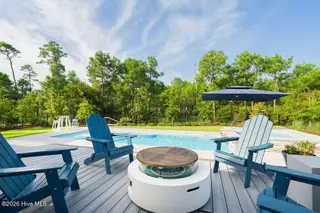 3211 Oceanic Bay Drive, Southport, NC 28461 — 4-bedroom home in St James, Southport, NC, photo 5 of 38: Fire Feature