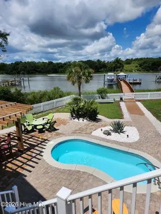 1404 W Yacht Drive, Oak Island, NC 28465 – photo 20: outdoor summertime