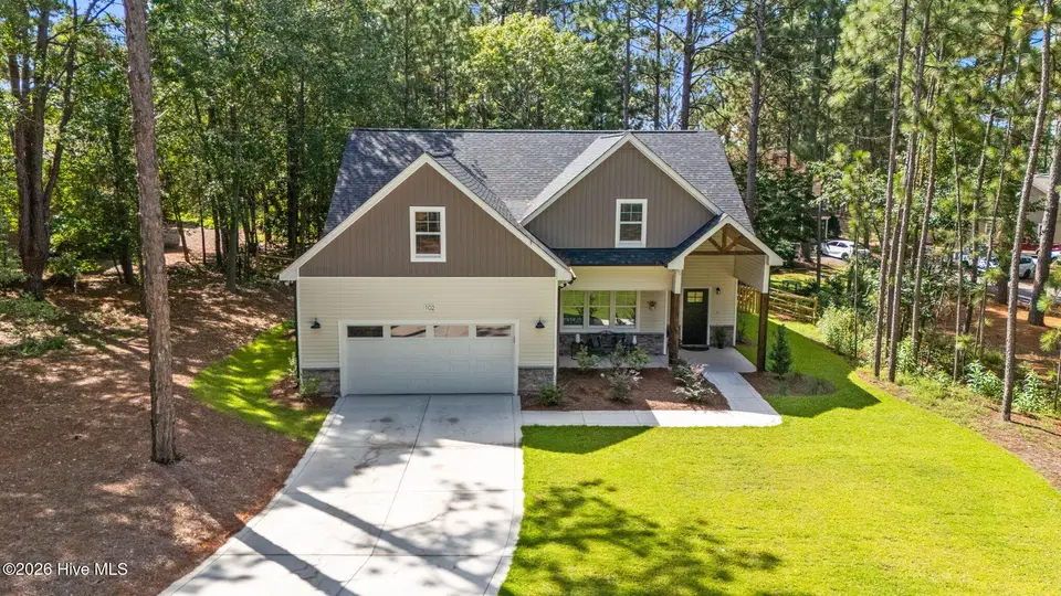 102 Dartmoor Lane, Seven Lakes, NC 27376 – photo 1 of 58: 8-web-or-mls-DJI_20250809105325_0510_D