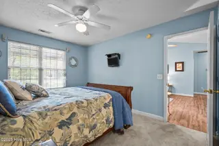 213 NE 48th Street, Oak Island, NC 28465 – photo 15: 18-web-or-mls-Photo Aug 21 2025, 10 53 3