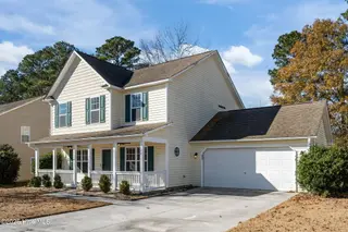 122 Tanbark Drive, Jacksonville, NC 28546 — 3-bedroom home in Aragona Village, Jacksonville, NC, photo 2 of 53: Front
