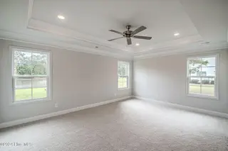 1025 Wood Creek Road NE, Leland, NC 28451 – photo 17: *REPRESENTATIVE PHOTO* Master Bedroom