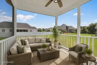109 Michelle Dawn Drive, Goldsboro, NC 27534 – photo 16: 4 Screened in Patio Staged with AI