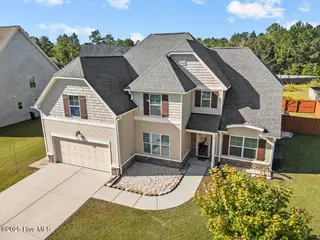 408 Cyrus Thompson Drive, Jacksonville, NC 28546 – photo 1: DJI_20251009100721_0527_D