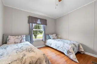 1109 Nautical Lane SW, Calabash, NC 28467 — 4-bedroom manufactured home in Village At Calabash, Calabash, NC, photo 23 of 34: Guest bed 1