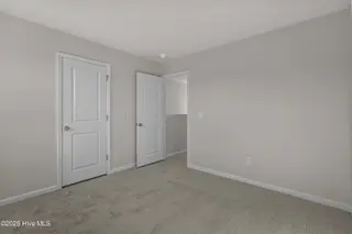313 Parkington Lane 86a, Ocean Isle Beach, NC 28469 – photo 24: upstairs bedroom