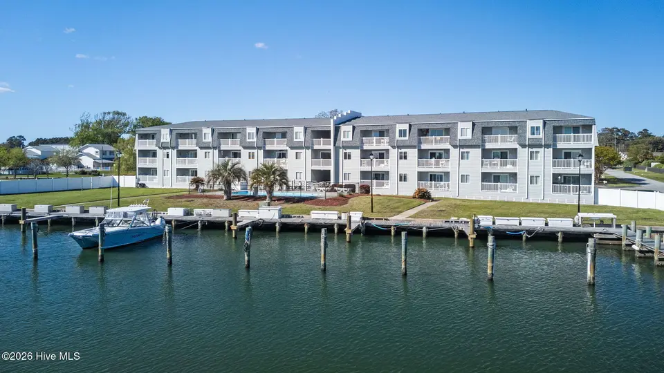 118 Lake Avenue 303, Morehead City, NC 28557 – photo 1 of 40: 1-web-or-mls-DJI_20260410164429_0380_D