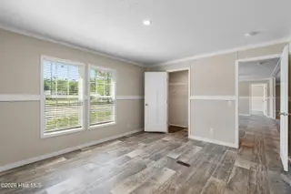 6830 Lewis Drive SE, Winnabow, NC 28479 – photo 24: Master bedroom