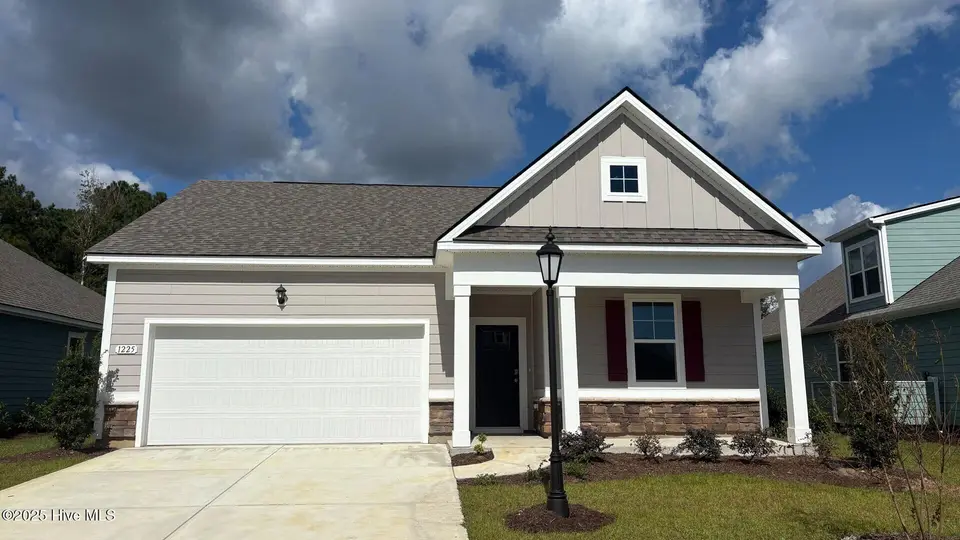 1225 Woodhouse Drive NW, Ash, NC 28420 – photo 1 of 26: Lot 31 - 1225 Woodhouse Drive