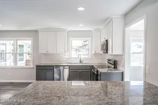 255 Foxcroft Road, Whispering Pines, NC 28327 – photo 11: Kitchen with Stainless Steel Appliances