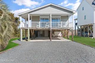 316 E Dolphin Drive, Oak Island, NC 28465 – photo 1: 316EDolphinDr - 1