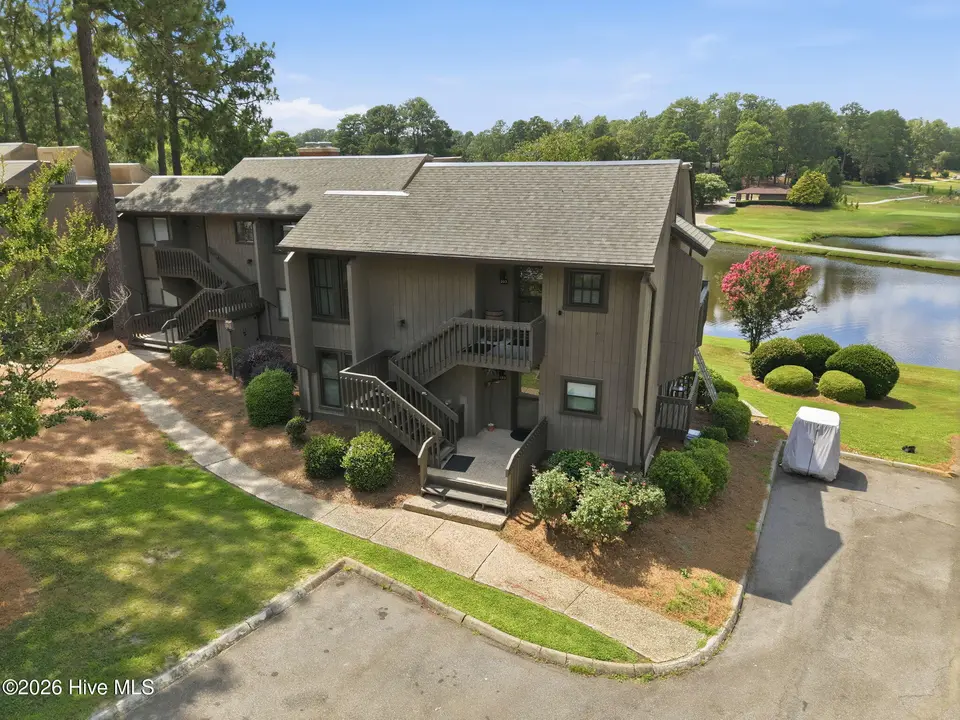 1175 Saint Andrews Drive # 103, Pinehurst, NC 28374 – photo 1 of 77: 4-web-or-mls-DJI_20260701153123_0532_D