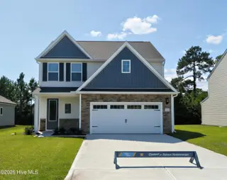 200 S Umbrella Palm Drive, Hampstead, NC 28443 — 4-bedroom home in Southwater Village, Hampstead, NC, photo 1 of 2: 200 Umbrella Palm