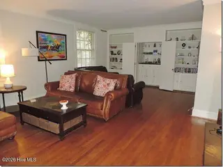 131 Ripley Road NW, Wilson, NC 27893 — 4-bedroom home in Recreation Park, Wilson, NC, photo 9 of 53: 8 Living Room _ Wet Bar _ Built-Ins