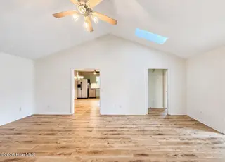 537 Chattooga Place Drive, Wilmington, NC 28412 — 3-bedroom home in Chattooga Place, Wilmington, NC, photo 21 of 69: Living Room to Kitchen