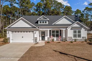 180 Boundaryline Drive NW, Calabash, NC 28467 – photo 1: Front of Home