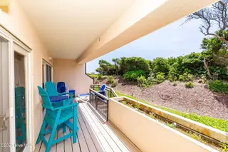 331 Salter Path Road 104 Beachwalk, Pine Knoll Shores, NC 28512 – photo 9: Covered deck w/ ocean views