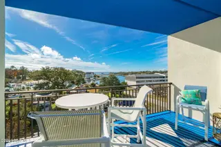 4425 Arendell Street 303 Harborside Club At 70 West, Morehead City, NC 28557 – photo 11: Covered porch w/ great water views