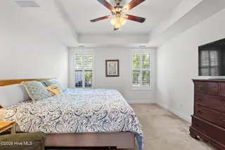 256 Downing Glen Place, Calabash, NC 28467 — 4-bedroom home in The Farm, Calabash, NC, photo 17 of 42: Primary bedroom