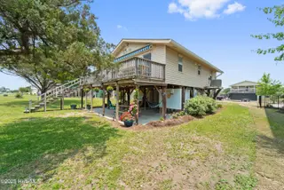 3526 E Dolphin Drive, Oak Island, NC 28465 – photo 22: Front/Side