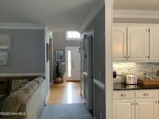 3300 Upton Court, Wilmington, NC 28409 — 5-bedroom home in Woodberry Forest, Wilmington, NC, photo 12 of 39: kitchen familyroom hall