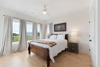 855 Cannonsgate Drive, Newport, NC 28570 – photo 16: First floor bedroom with porch access