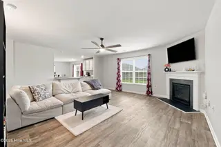 212 Gracie Farms Road, New Bern, NC 28560 — 4-bedroom home in Tyler, Home on the Lake, New Bern, NC, photo 12 of 32: Living Room to Kitchen