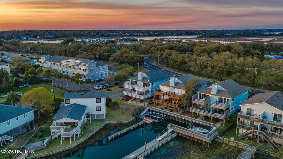 304 Causeway Drive Unit A, Wrightsville Beach, NC 28480 — 3-bedroom condo in Windswept, Wrightsville Beach, NC, photo 1 of 52: 001_dji_20260319192304_0731_d_copy_664