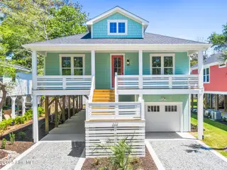 322 NE 50th Street, Oak Island, NC 28465 – photo 1: 001_322_ne-01_75