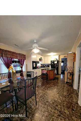 203 Brentwood Circle, Dudley, NC 28333 – photo 6: Kitchen-Dining Rm