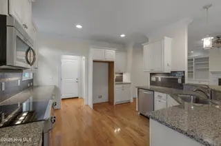 402 Cornubia Drive, Castle Hayne, NC 28429 – photo 21: Cornubia402-6kitShaneL33A4783-CR2