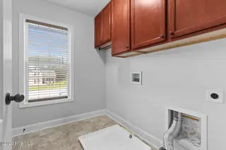 302 First Post Road, Jacksonville, NC 28546 — 4-bedroom home in Towne Pointe, Jacksonville, NC, photo 20 of 38: Laundry Room