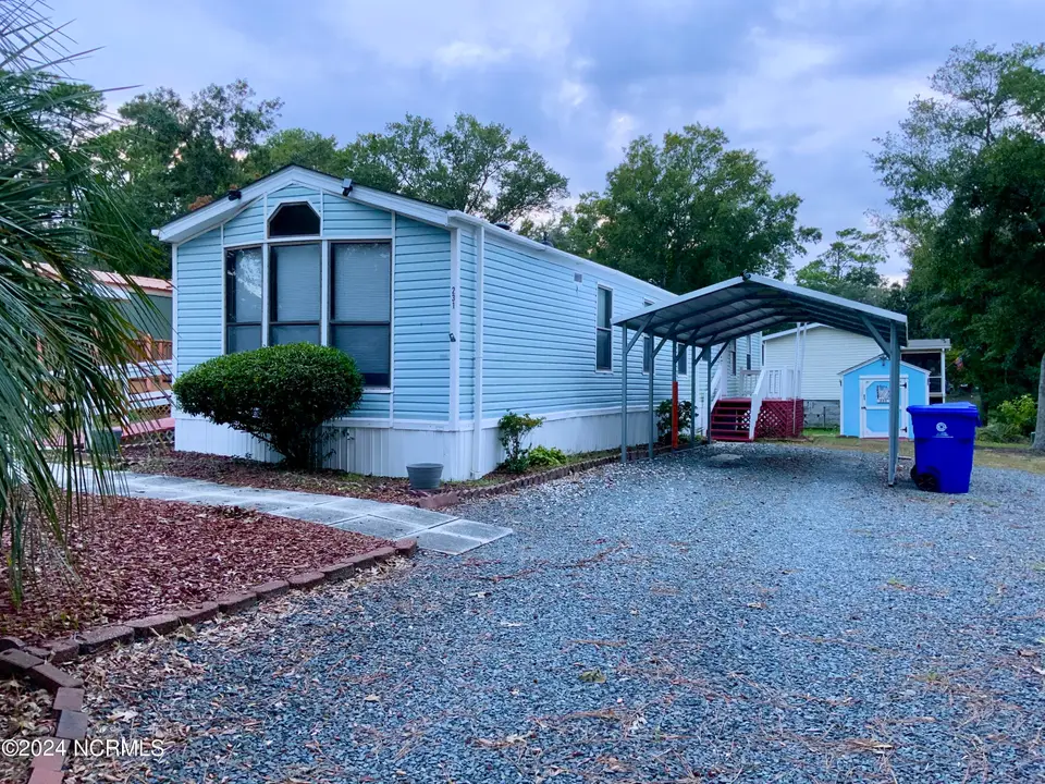 231 NE 67th Street, Oak Island, NC 28465 – photo 1 of 19: IMG_5899