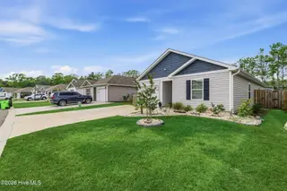 2028 Course Lane, Surf City, NC 28445 – photo 2: updated grass 2