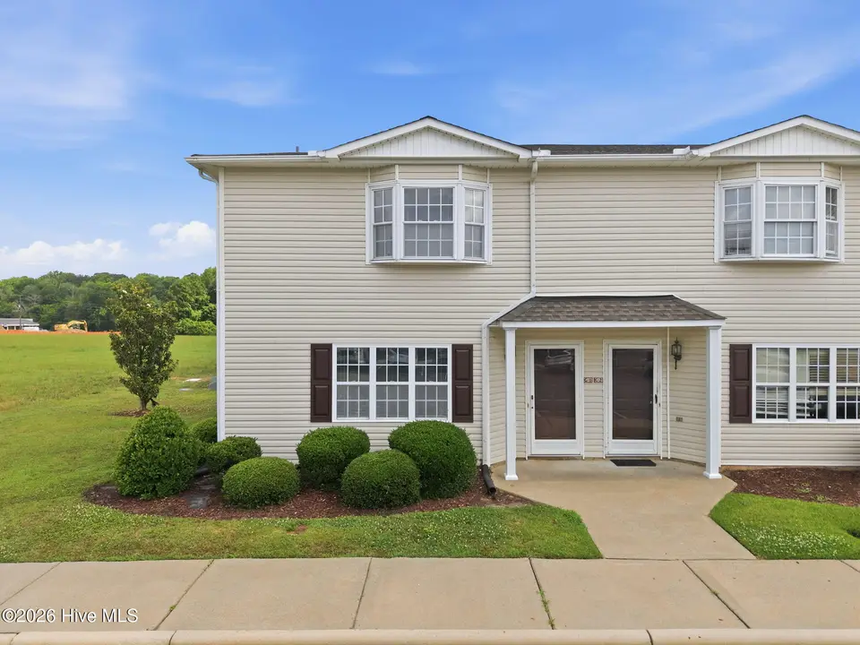 2128 Flagstone Court G1, Greenville, NC 27834 – photo 1 of 25: Front view of 2128 Flagstone Court, Unit