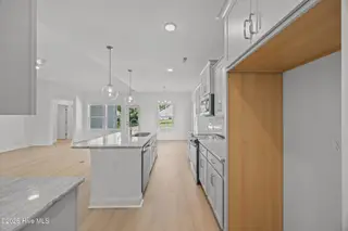 4503 Village Green Drive SW Homesite 91, Shallotte, NC 28470 — 3-bedroom home in Village Green SHLTE, Shallotte, NC, photo 17 of 49: 17_kitchen