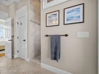 6414 Ocean Drive, Emerald Isle, NC 28594 – photo 22: Master bathroom with tile walk in s