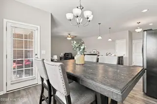 613 Knoll Circle, Greenville, NC 27858 – photo 24: Kitchen to Screen Patio
