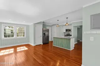 102 N 25th Street, Wilmington, NC 28405 — 2-bedroom home, Wilmington, NC, photo 8 of 35: Open Kitchen - Sunroom
