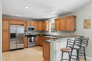 133 NE 3rd Street, Oak Island, NC 28465 – photo 6: Kitchen