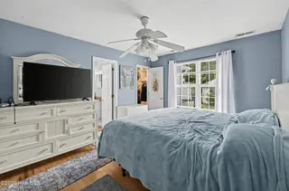 121 NE 6th Street, Oak Island, NC 28465 – photo 10: 23_121_NE_6th_St-Bedroom-GE79
